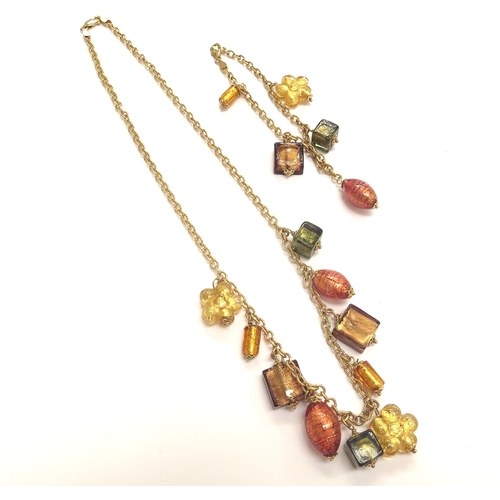 9448 - A 9ct gold necklace with Murano glass drops with a matching bracelet