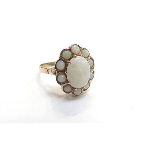 9324 - A Circa 1930's gold opal cluster ring, unmarked. Size N, 2.5g