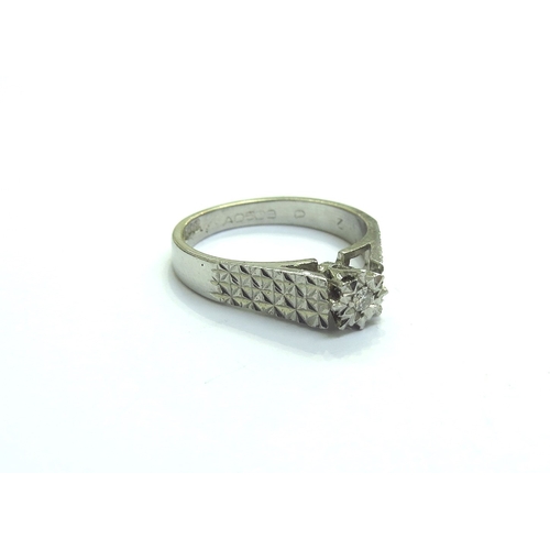 9366 - A platinum illusion set diamond ring. Size M, 5.2g                (E) £70-100