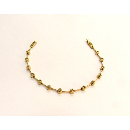 9029 - An 18ct gold flexible link bracelet set with fourteen small diamond in rubover setting, 18.5cm long,... 