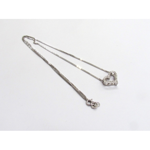 9292 - An 18ct white gold diamond heart pendant hung on a 9ct white gold chain, 40cm long, 3.9g   (R) £700