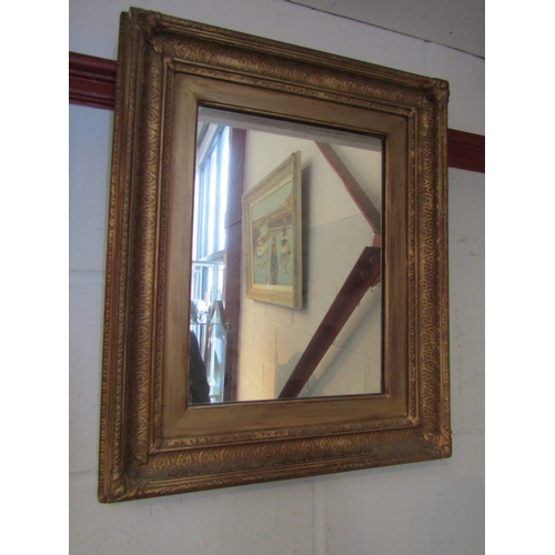 1012 - A gilt framed wall mirror, 56cm x 46cm total