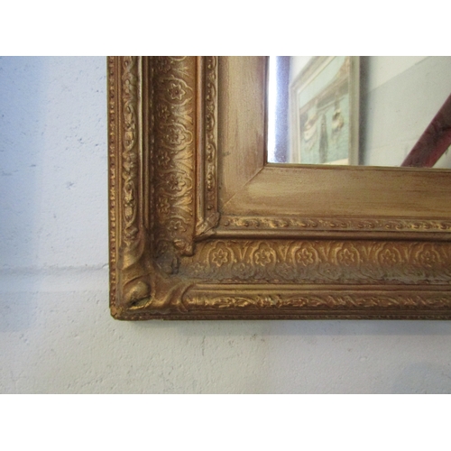 1012 - A gilt framed wall mirror, 56cm x 46cm total