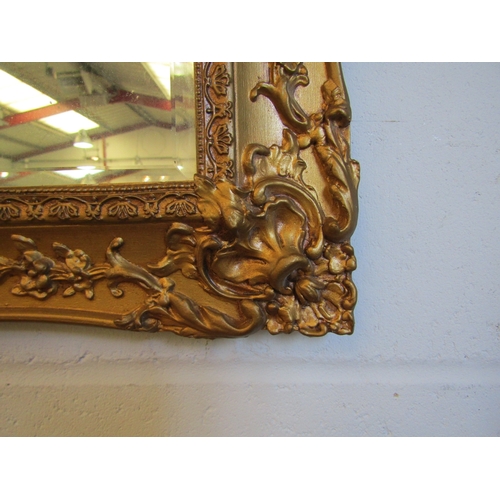 1014 - A modern gilt framed classical style wall mirror, 60cm x 76cm total