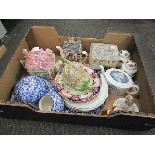 1124 - A box of ceramics including a Wedgwood teapot, two Royal Albert Old Country Roses pots etc.