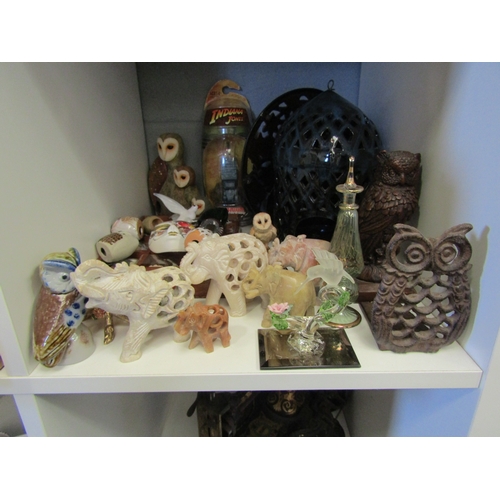 1258 - A collection of miniature pottery owls together with other decorative objects