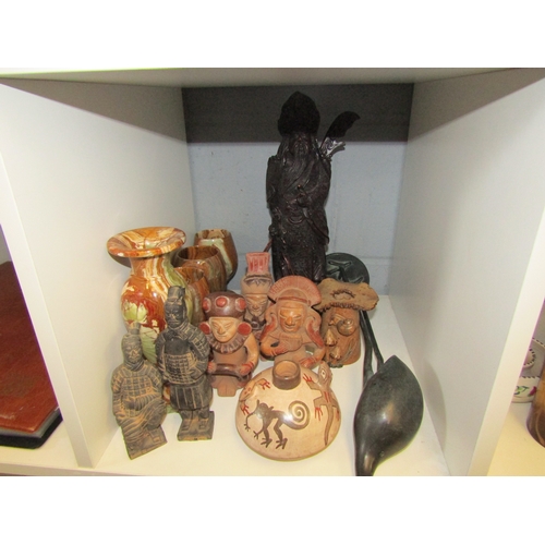 1261 - A collection of reproduction Southern/Central American items including figures, vases etc.