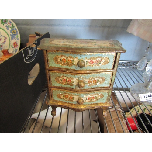 1347 - A gilt cherub, gilt mirror and French jewellery drawers