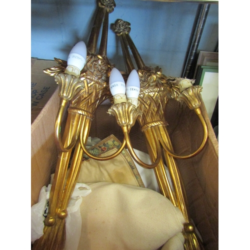 1353 - A pair of modern gilt wall sconces, place mats etc.      (Group)