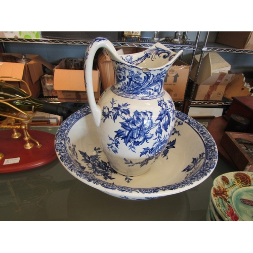 1380 - A Burslem Pottery blue and white wash jug and bowl with floral design, jug chipped, large hairlines ... 