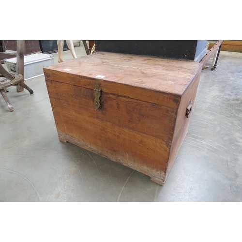 2023 - An Eastern teak chest with brass latch, zinc lined