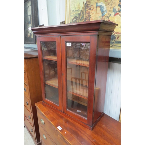 2102 - A Victorian mahogany two door bookcase