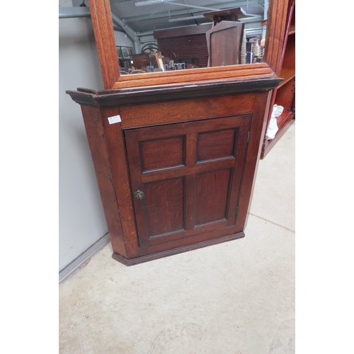 2124 - A 19th Century oak corner cupboard   (E) £15-20