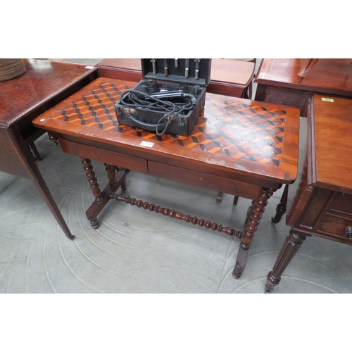 2128 - A Victorian parquetry top side table set with two drawers on bobbin turned supports