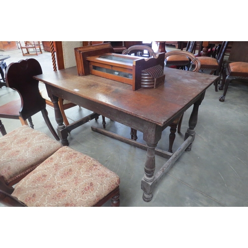 2144 - An 19th Century oak kitchen table with stretcher 90cm x 122cm