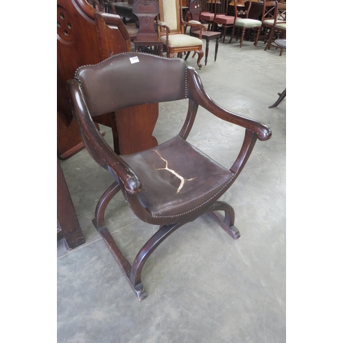 2159 - An X frame Savonarola throne chair   (E) £20-30