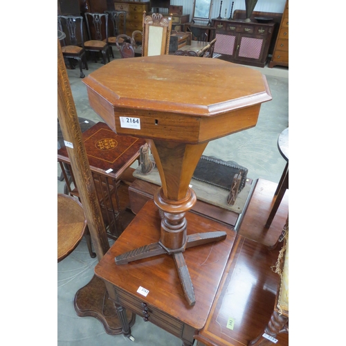 2164 - An oak octagonal sewing box