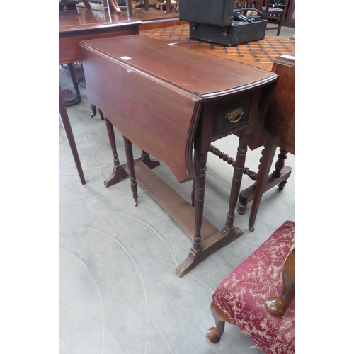 2167 - A mahogany drop flap, gate legged table with two drawers