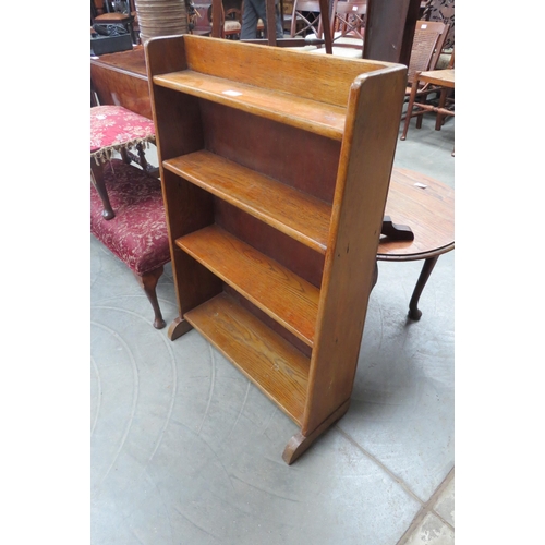 2170 - An oak four tier shelving unit