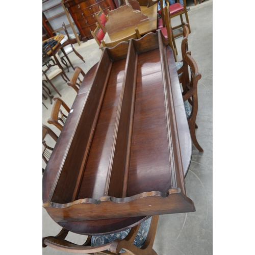 2180 - A mahogany three tier display shelf