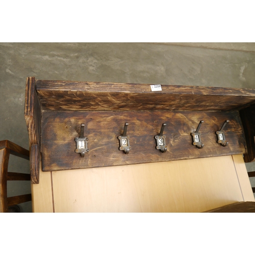 2208 - A coat hook rack with numbered hooks   (R) £20