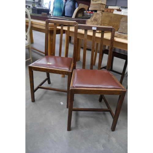 2209 - Four oak dinning chairs