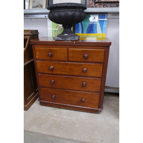 2217 - A Victorian mahogany round-cornered chest of two short over three long drawers