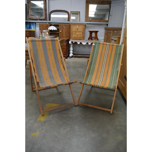 2237 - Two vintage canvas deck chairs