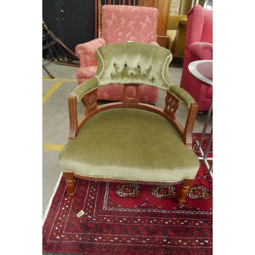 2251 - A walnut green velvet nursing chair