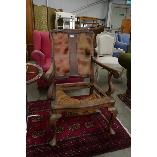 2253 - A mahogany rattan scroll armchair seat as found