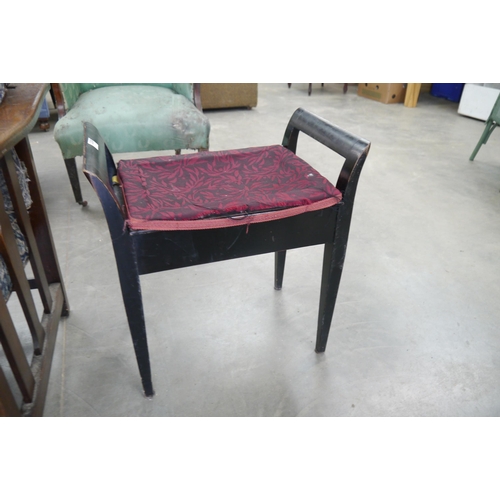 2258 - A black painted music stool, seat a/f   (R) £10