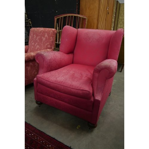 2262 - A 1920's country house arm chair on bun feet