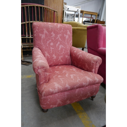 2263 - A 1920's armchair in red upholstery