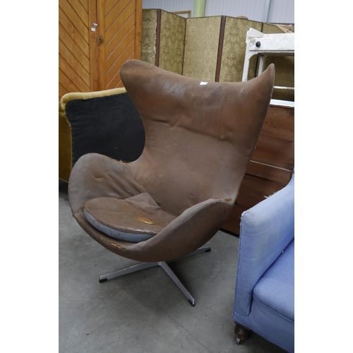 2265 - A brown egg chair for reupholstery