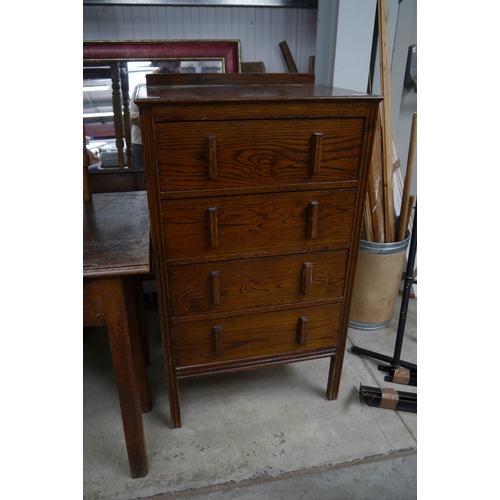 2270 - A 1940's Deco style oak chest of four long drawers, reeded sides and legs