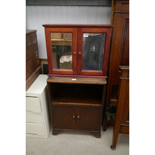 2296 - A oak bedside cabinet and a mirrored bathroom cabinet