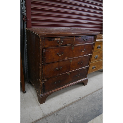 2298 - An early 18th Century walnut chest of two short over three long drawers, strung inlay, replacement h... 