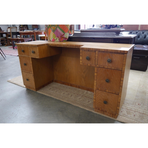 2344 - An oak dressing table with eight drawers   (R) £70