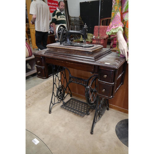 2348 - A Singer sewing machine on treadle base