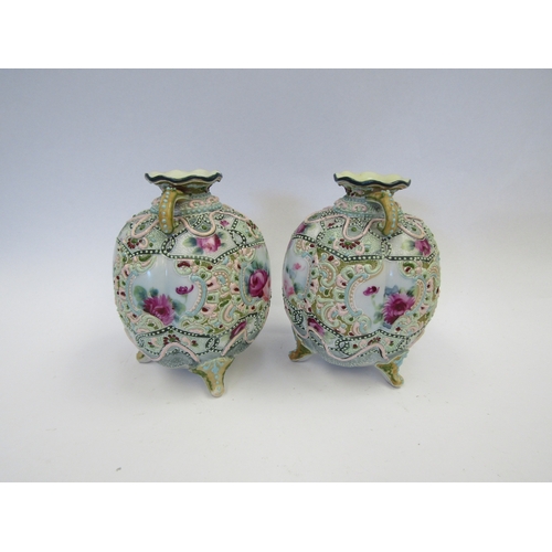 1268 - A pair of 20th Century Nippon Moriage bulbous form vases with raised decoration and floral panels, t... 