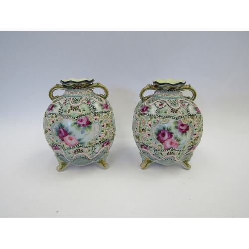 1268 - A pair of 20th Century Nippon Moriage bulbous form vases with raised decoration and floral panels, t... 