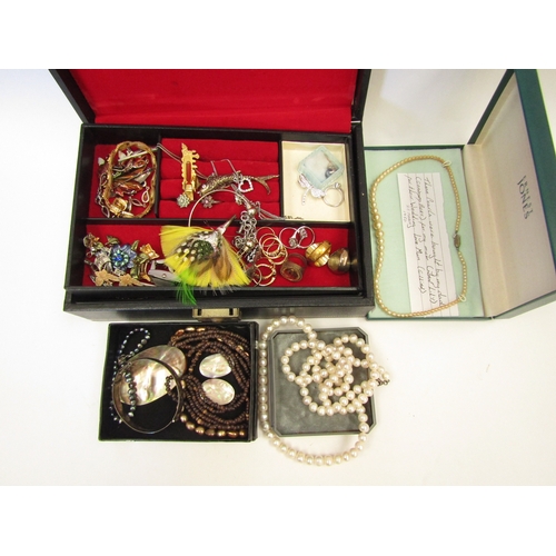 1276 - A jewellery box containing a quantity of costume jewellery etc. including various rings, bracelets, ... 