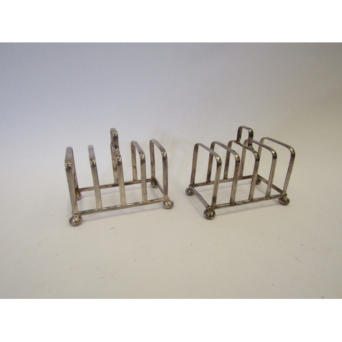 1280 - A pair of silver four slice toast racks, Sheffield 1960, James Dixon & Sons Ltd.  Weight approximate... 