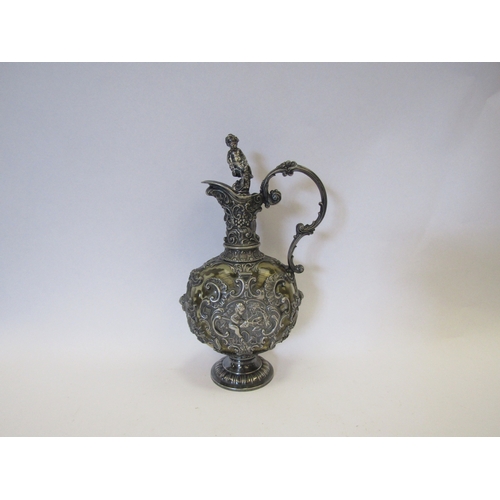 1282 - A 19th Century Bacchus style carafe with ornate plated mask and cherub design, green glass body with... 