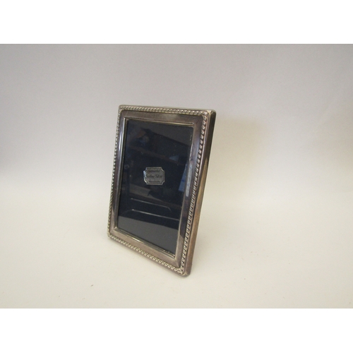 1284 - A silver photograph frame, Sheffield 1989, height approximately 16cm