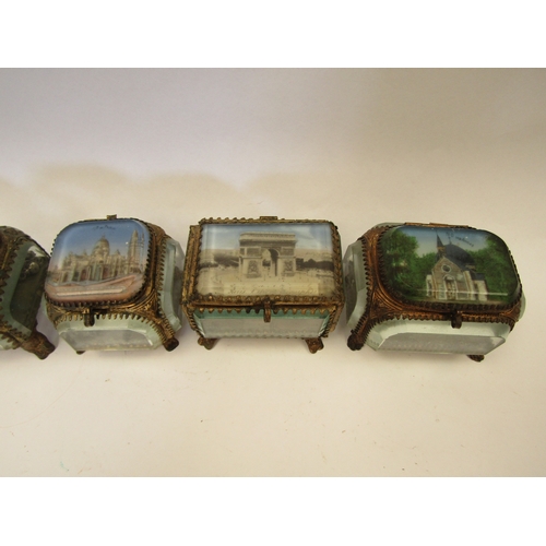 1314 - A collection of early-mid 20th Century facet glass and ormolu tourist jewellery boxes with scenic vi... 