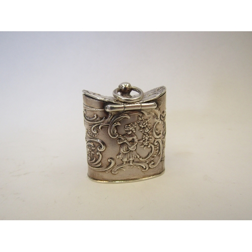 1322 - A Dutch silver peppermint box with embossed decoration.  Import marks London 1902