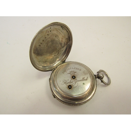 1324 - A white metal hunter pocket watch with ornate floral engraved case stamped Double D'or K18, with sil... 