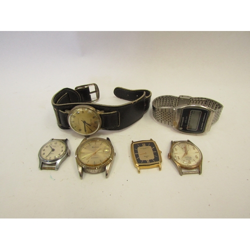 1333 - Three gentleman's wristwatches and four watch faces