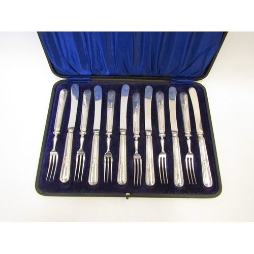 1338 - A cased set of six silver handled dessert knives and forks, Sheffield 1905, Fattorini & Sons Ltd